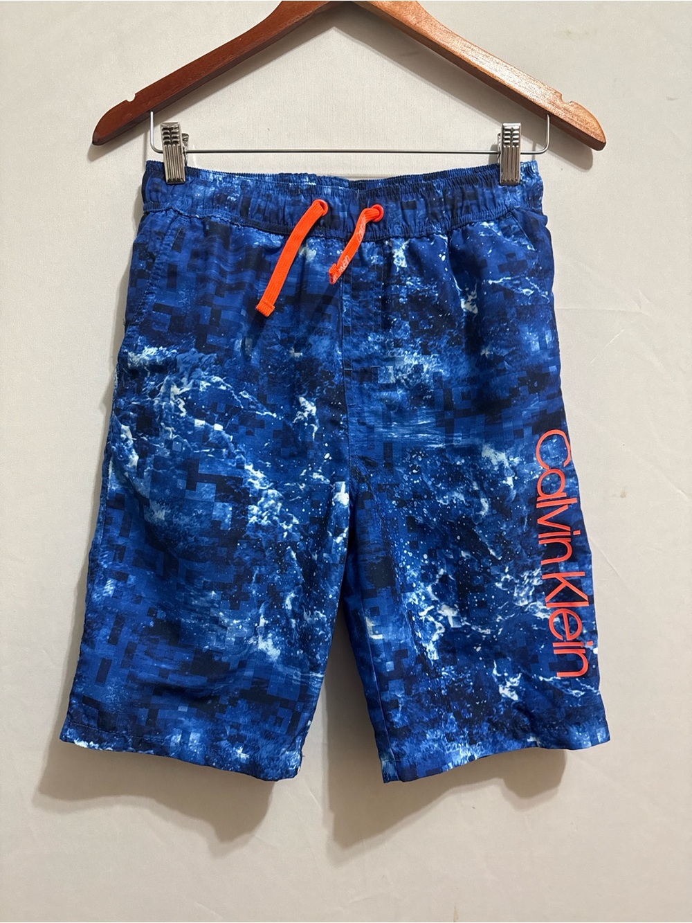Youth Calvin Klein Blue Swim Shorts with Orange Accents